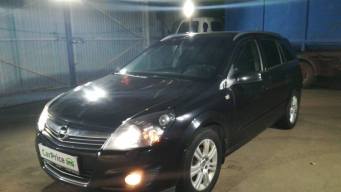 Opel Astra H 1.6 AT (115 л.с.) [2008]